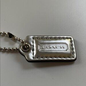 Vintage Coach Metallic silver tag